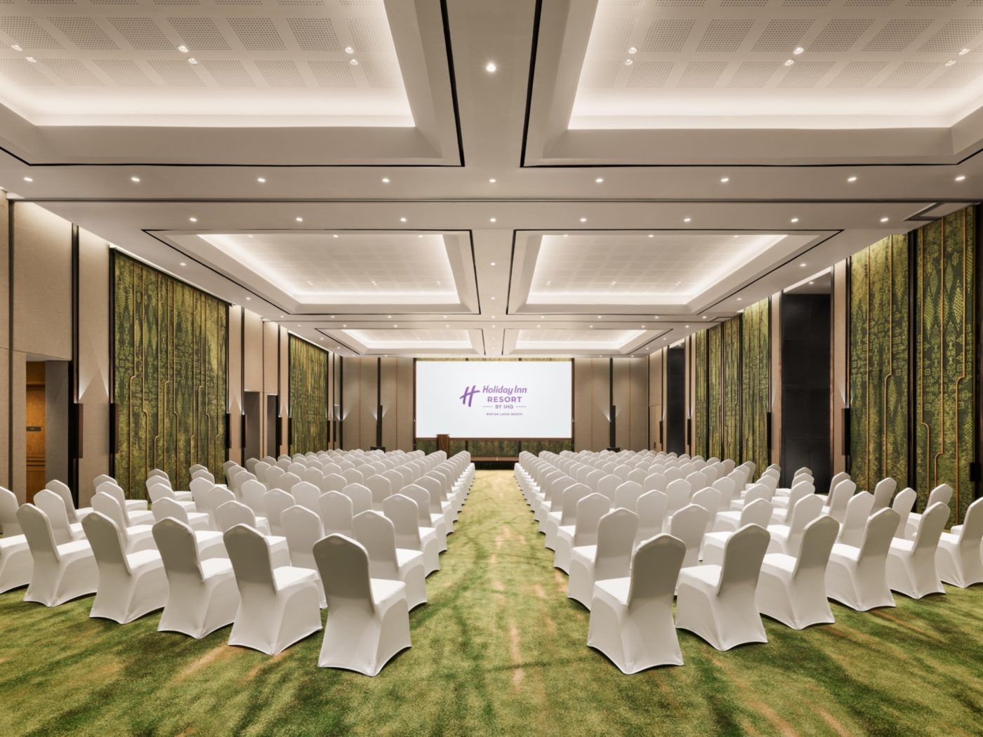 Ballroom set for a seated gathering at Holiday Inn Resort Bintan Lagoi Beach
